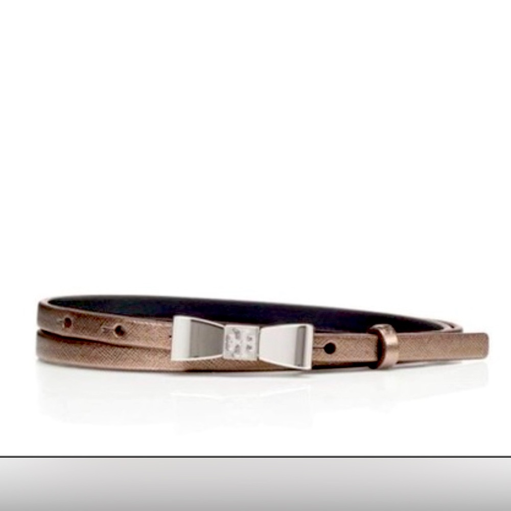 Tory Burch skinny belt. Silver bow buckle. Excellent used condition. Size XXS.